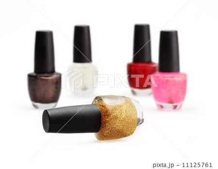 colorful nail polish set on white background isolated 11125761