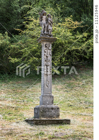 Stone baroque sculpture of two saints, saint Roch and saint Seba 11125946