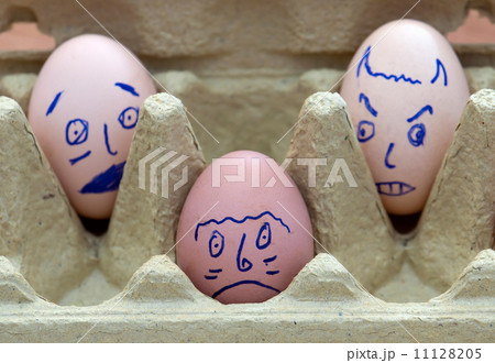 Three face painted eggs Three face painted eggs 11128205