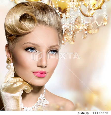 Vintage styled girl with perfect make up and hairstyl 11136676