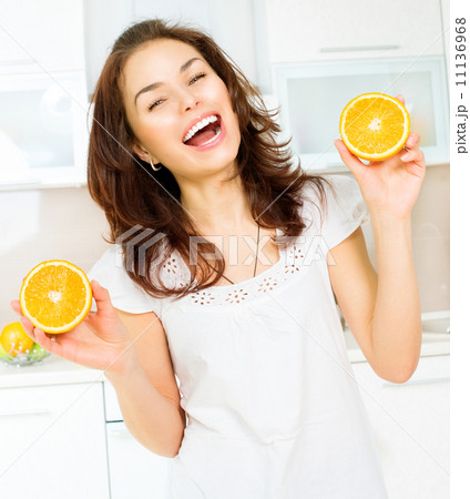 Healthy Funny Woman with Oranges. Diet and Healthy Eating Healthy Funny Woman with Oranges. Diet and Healthy Eating 11136968
