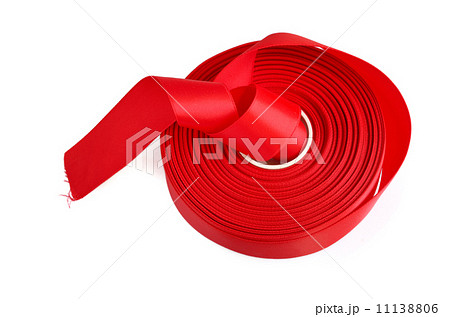 Red ribbon roll isolated on a white 11138806