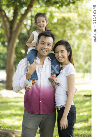 Happy Asian family at the park. 11143549