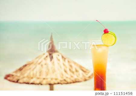 Long Island cocktail with fruits decoration at tropics Long Island cocktail with fruits decoration at tropics 11151456