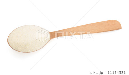 semolina in spoon on white 11154521