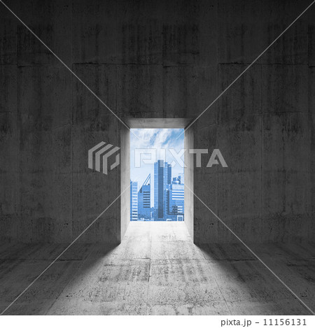 Abstract dark concrete interior with glowing door and city view 11156131