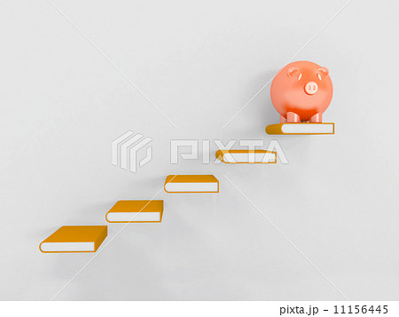 piggy on book attached with wall as steps 11156445