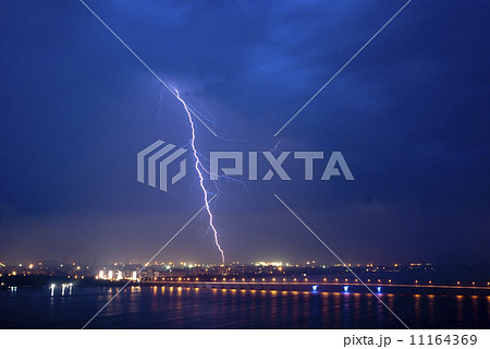View of a lightning over city at night View of a lightning over city at night 11164369