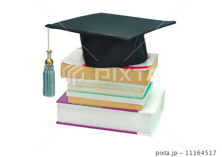 Graduation cap on top of a stack of books Graduation cap on top of a stack of books 11164517