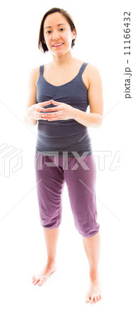 Young woman smiling with hands clasped 11166432