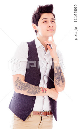 Young woman standing with her hand on chin 11166890