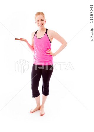 Young woman showing something and smiling 11167041