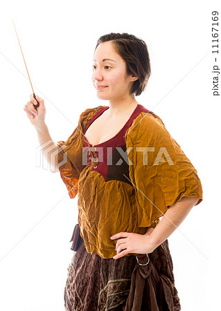 Conductor standing with holding a baton 11167169