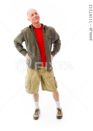 Senior man standing with arms akimbo and thinking Senior man standing with arms akimbo and thinking 11167212
