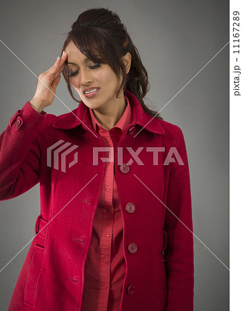 Indian young woman suffering from headache Indian young woman suffering from headache 11167289