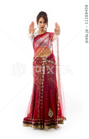 Young Indian woman making stop gesture sign from both hands Young Indian woman making stop gesture sign from both hands 11168408