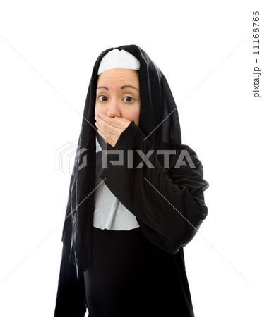 Young nun with hand over her mouth 11168766