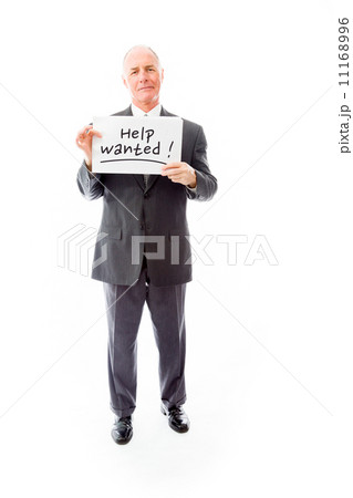 Businessman holding a message board with the text words "Help wa Businessman holding a message board with the text words "Help wa 11168996