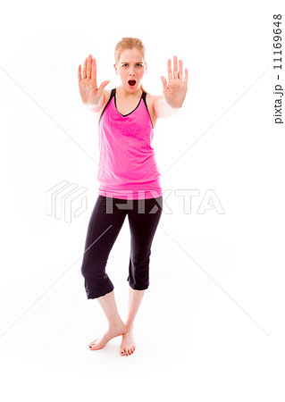 Young woman making stop gesture sign from both hands Young woman making stop gesture sign from both hands 11169648