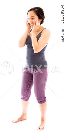 Young woman talking on mobile phone and smiling Young woman talking on mobile phone and smiling 11169804