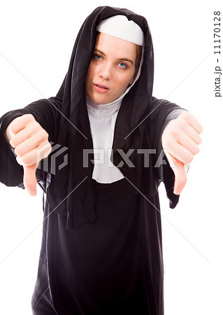 Young nun showing thumbs down sign from both hands Young nun showing thumbs down sign from both hands 11170128