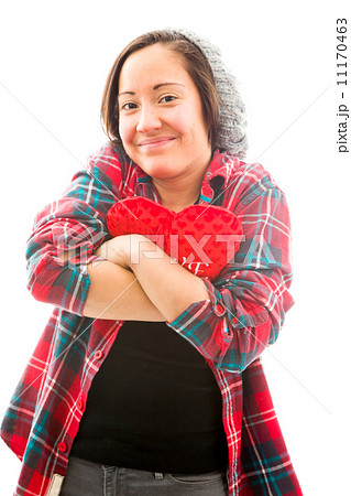 Young woman embracing heart shape 11170463