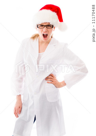Frustrated female scientist wearing Santa hat 11170488