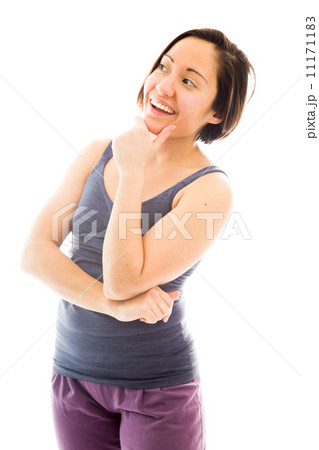 Young woman day dreaming and smiling Young woman day dreaming and smiling 11171183