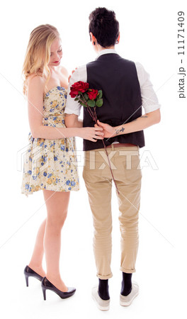 Woman taking flower from the back of her lesbian partner Woman taking flower from the back of her lesbian partner 11171409