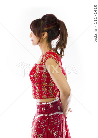 Side profile of an Indian young woman day dreaming 11171410