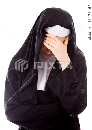Young nun looking depressed 11171462