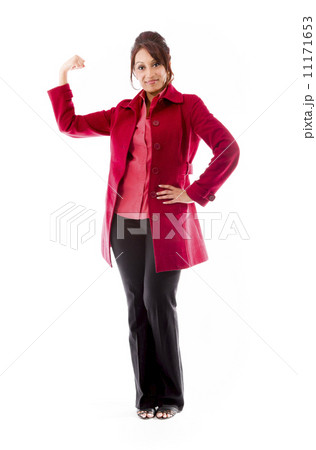 Indian young woman showing off her muscle Indian young woman showing off her muscle 11171653