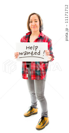 Young woman showing help wanted sign Young woman showing help wanted sign 11171712