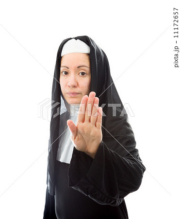 Young nun making stop gesture sign from both hands Young nun making stop gesture sign from both hands 11172657