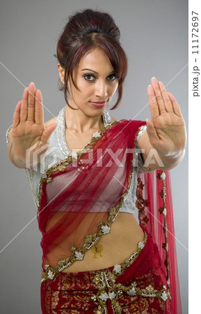 Young Indian woman making stop gesture sign from both hands 11172697