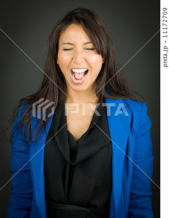 Happy young businesswoman shouting in excitement Happy young businesswoman shouting in excitement 11172709
