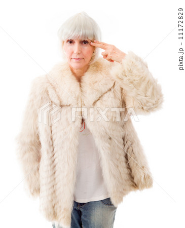 Senior woman holding her finger against her head 11172829