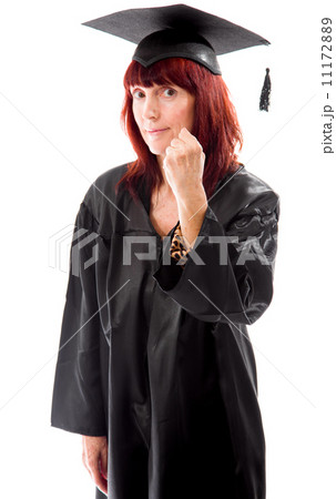 Mature student standing and showing her fist 11172889