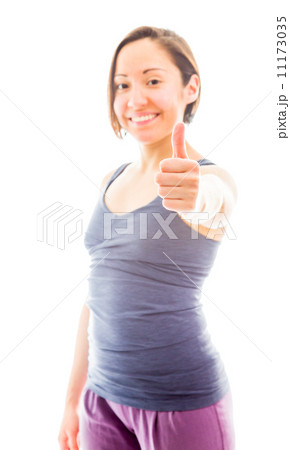 Young woman showing thumbs up sign 11173035