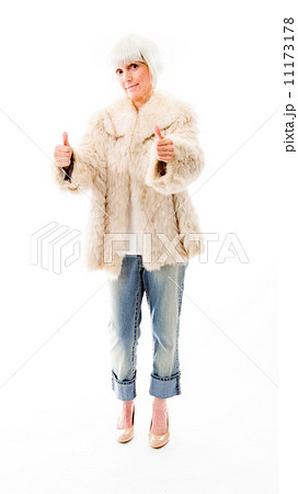 Senior woman showing thumbs up sign from both hands 11173178