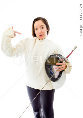 Female fencer pointing with holding a mask and sword 11173179