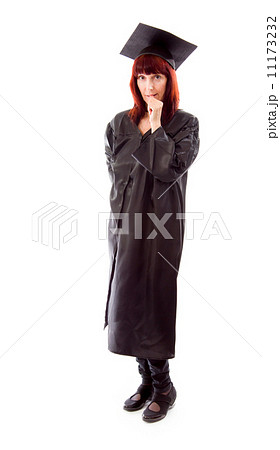 Mature student standing and biting fingernails Mature student standing and biting fingernails 11173232