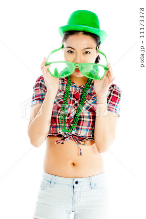 Isolated on white sexy asian cowgirl for st patrick's day 11173378