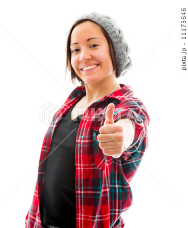 Young woman showing thumbs up sign and smiling Young woman showing thumbs up sign and smiling 11173646