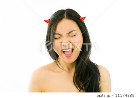 Devil side of a young naked Asian woman looking... - Stock Photo [11174839]  - PIXTA