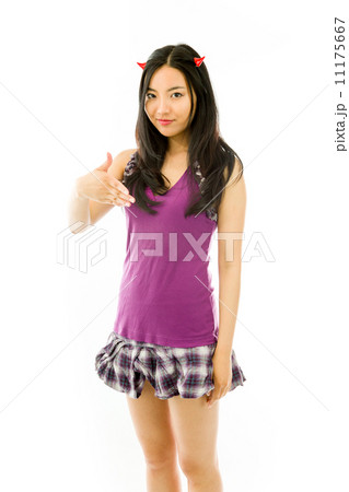 Asian young woman dressed up as a devil and offering hand for handshake isolated on white background 11175667