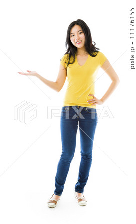 Young Asian woman showing product with open hand palm Young Asian woman showing product with open hand palm 11176155