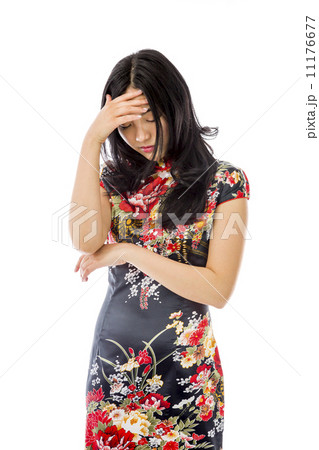 Asian young woman hiding her face 11176677