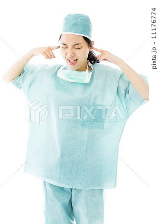 Asian female surgeon shouting with hands in ear Asian female surgeon shouting with hands in ear 11176774