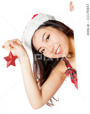 edge of the page Sexy asian santa claus holding decoration edge of the page Sexy asian santa claus holding decoration 11176847